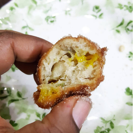 Ozoz's interpretation of puff puff, filled with mango and chili, rolled in cinnamon sugar. @kitchenbutterfly