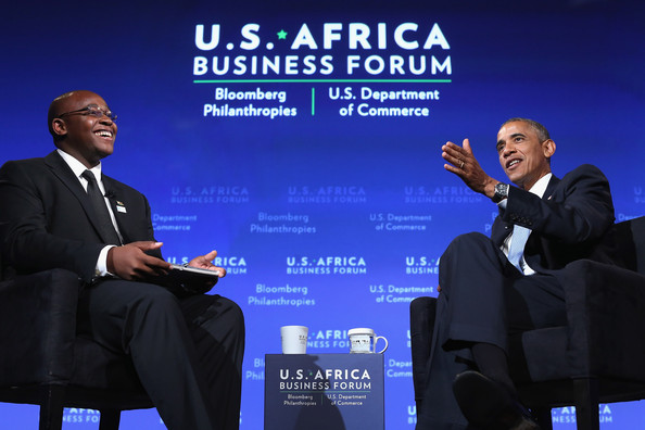 Takunda Chingonzo speaking with U.S. President Barack Obama during the U.S.-Africa Business Forum on the sidelines of the U.S.-Africa Leaders Summit in Washington, D.C. AGENCE FRANCE-PRESSE/GETTY IMAGES